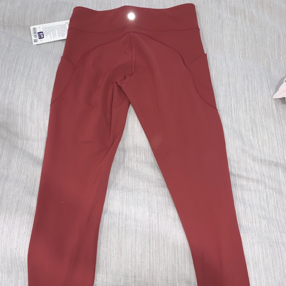 Lulu lemon invigorate HR tight 25”. Peach/pink. Size 10. Brand new